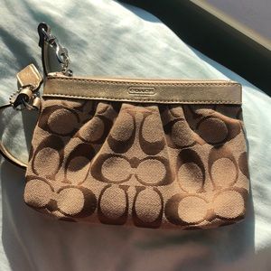 Large gold Coach wristlet